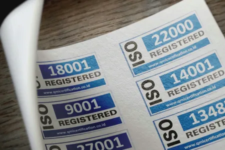 A paper containing various ISO-standard registration marks.