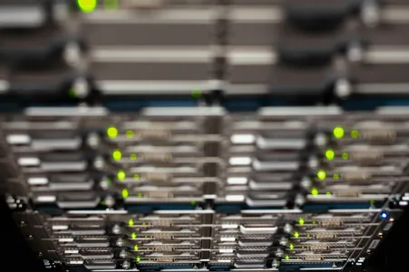A rack of servers with blinking lights